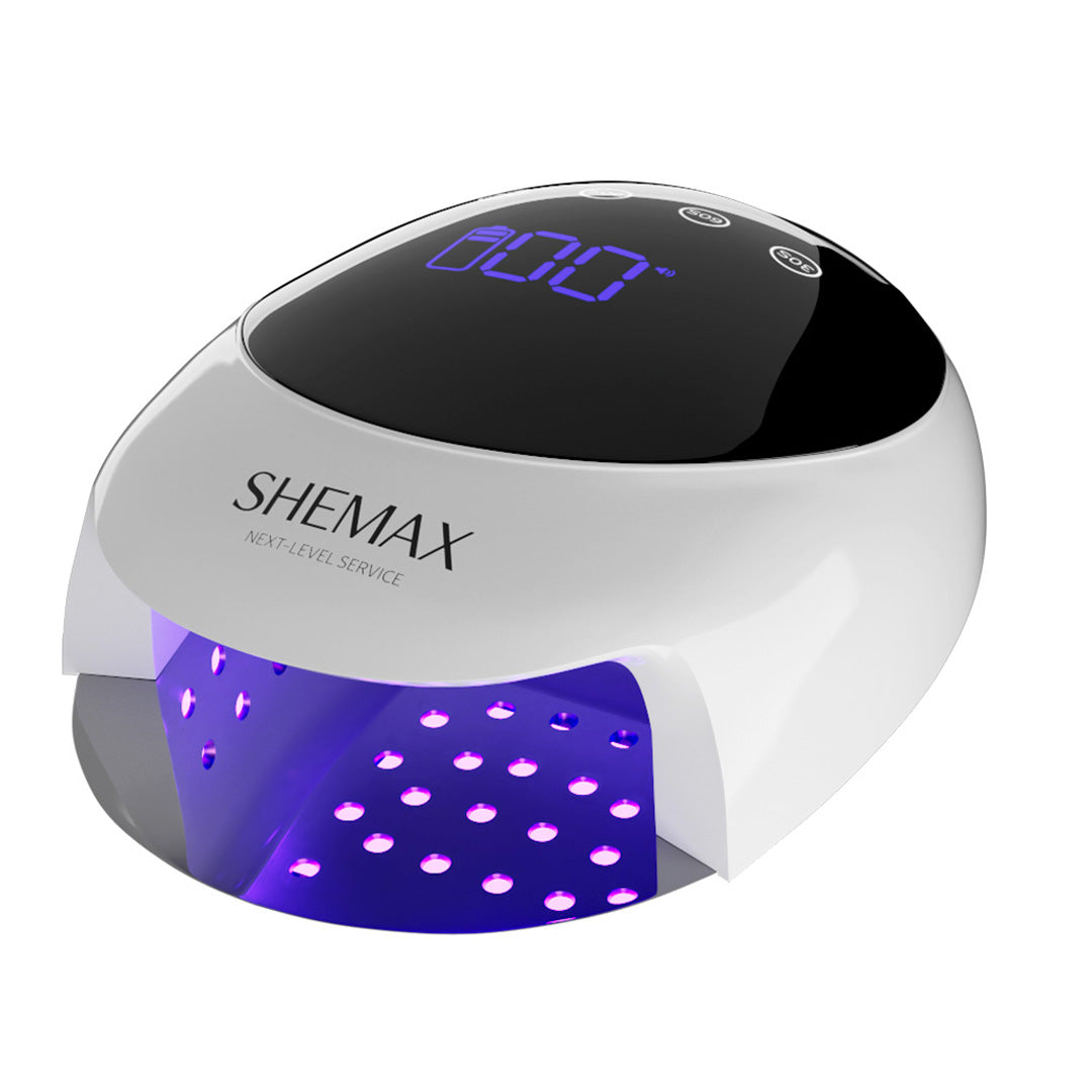 SheMax Pro Nail Lamp with innovative cold beam technology; enjoy free shipping for a perfect manicure experience.