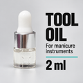 Tool oil, 2 ml, in a clear glass dropper bottle